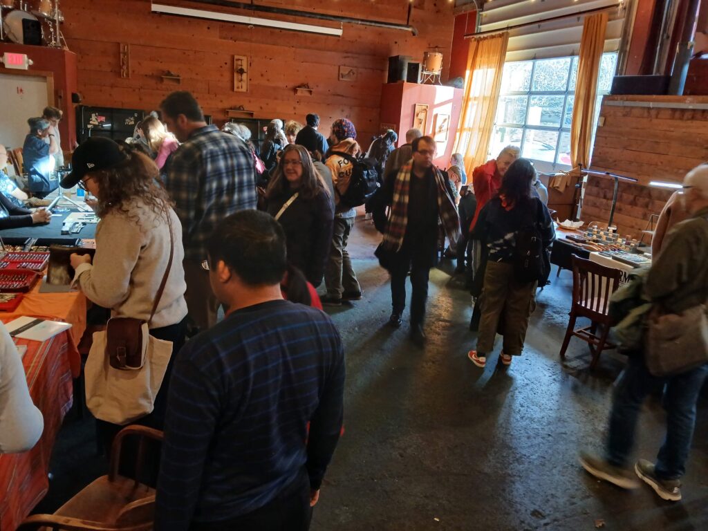 A crowd in a dimly lit room